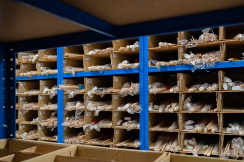 Hand Waving Flags shelf in Royal-Flags warehouse